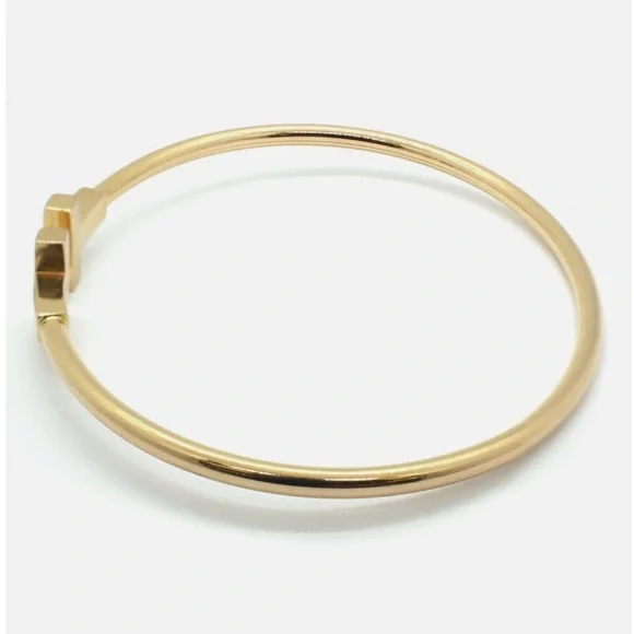GOLD DOUBLE T WIRE OPEN CUFF BRACELET